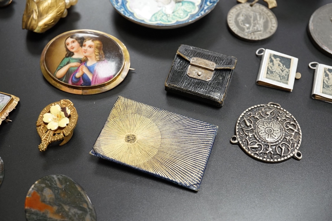 Objects of vertu and medals, including two Paris porcelain painted brooches, a leather cased almanac for 1827 and a painted ‘I Love You’ metal patch box